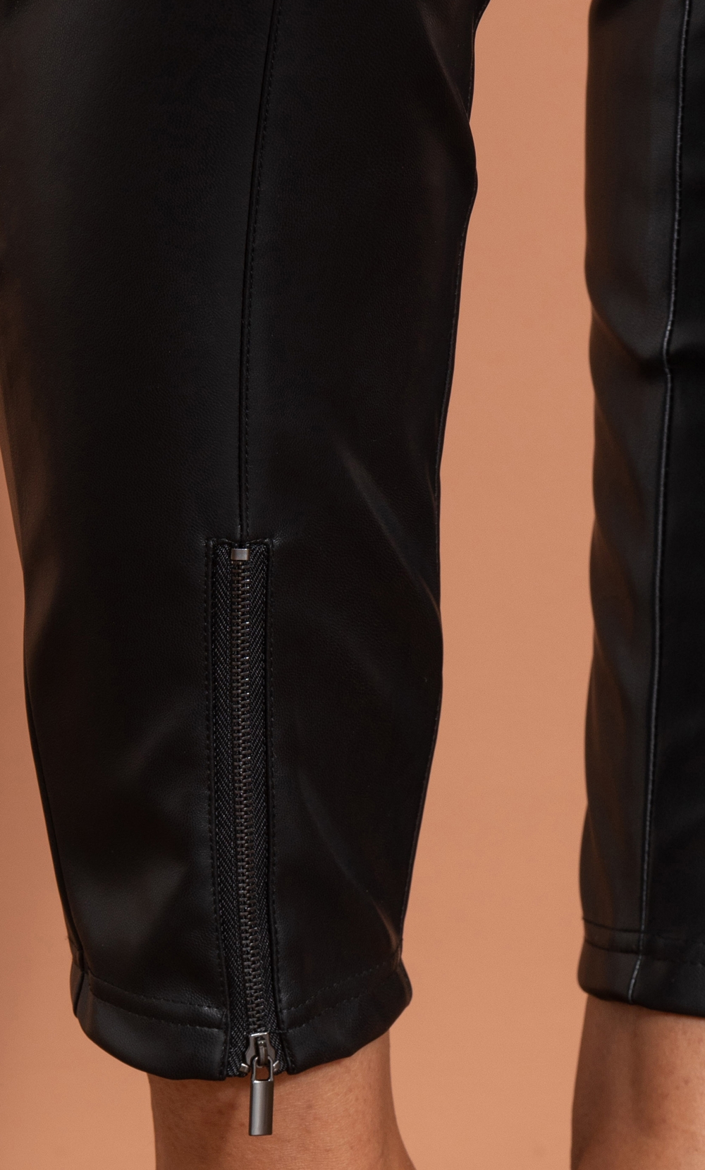 Faux leather tapered on sale trousers