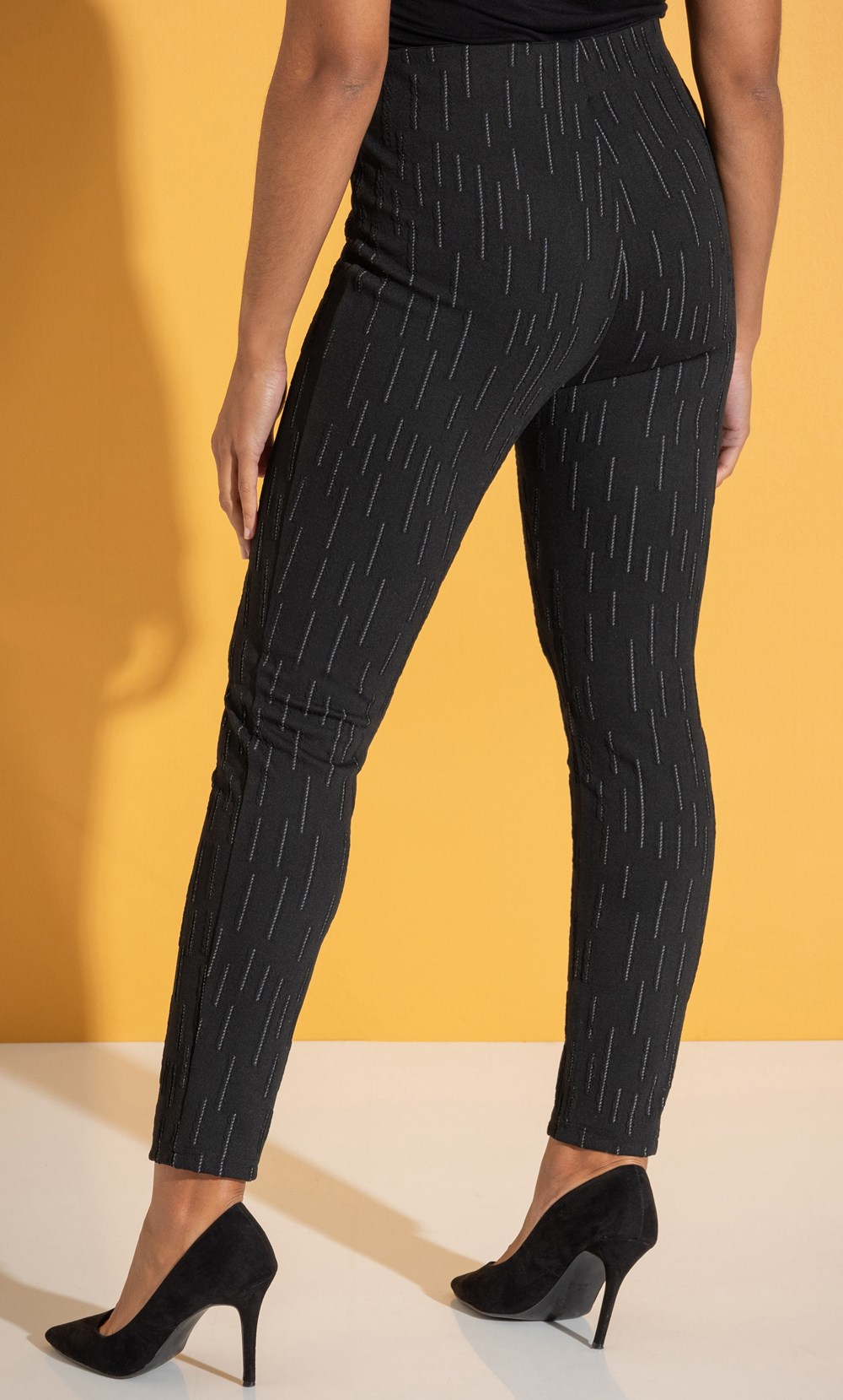 Black trousers outlet with yellow stripe